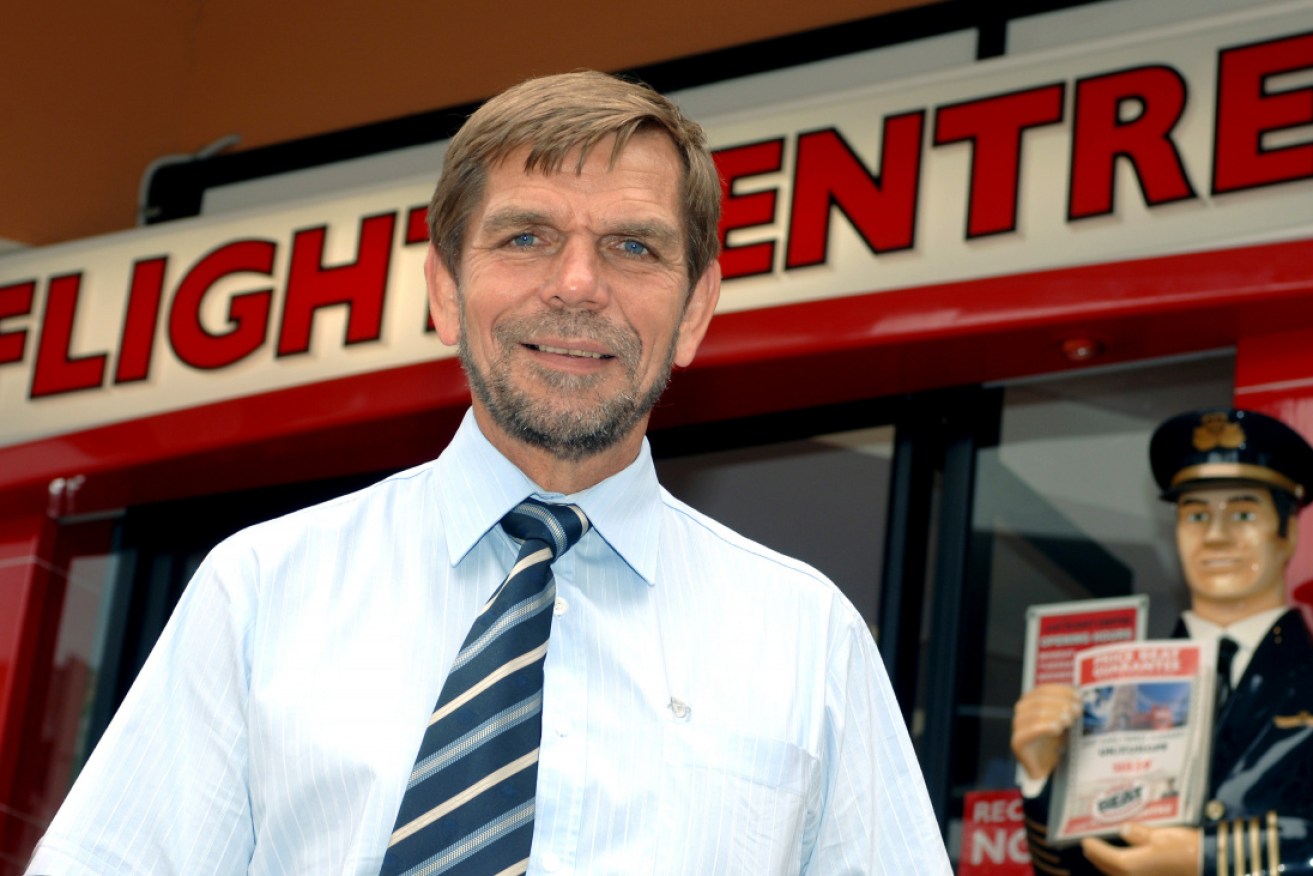 Flight Centre head Graham Turner says spending on travel is strong, despite living pressures.