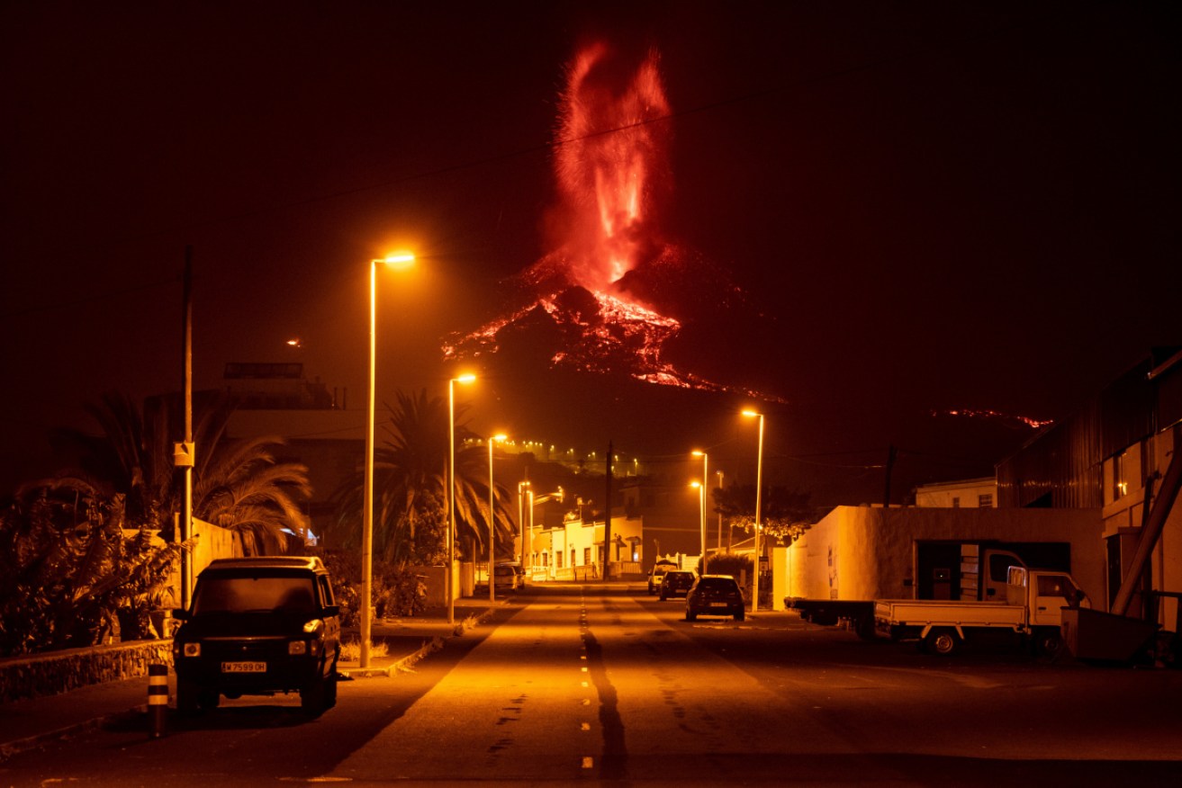 The eruption of Cumbre Vieja threatens more homes after part of its crater collapsed.