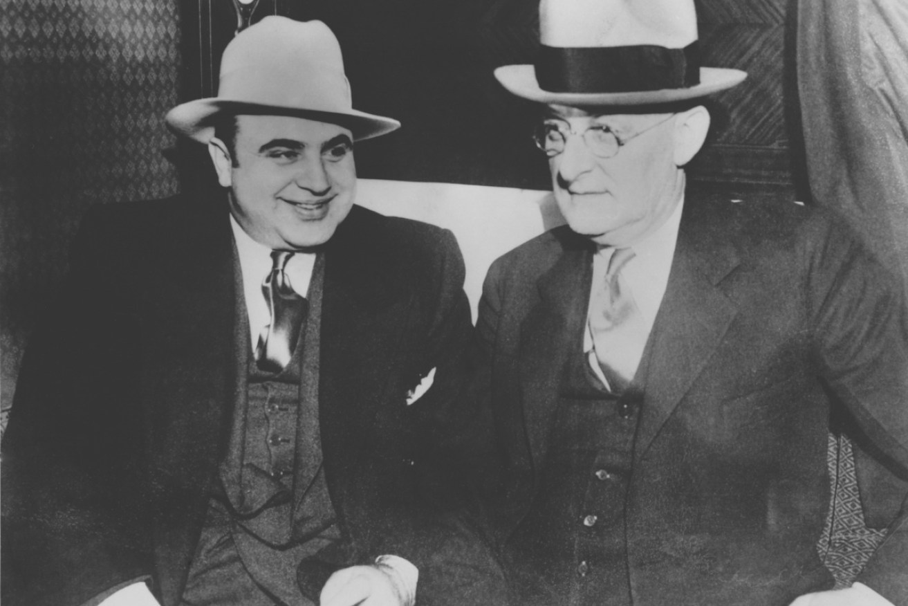 Al Capone (left) with US Marshall Laubenheimer in 1925.