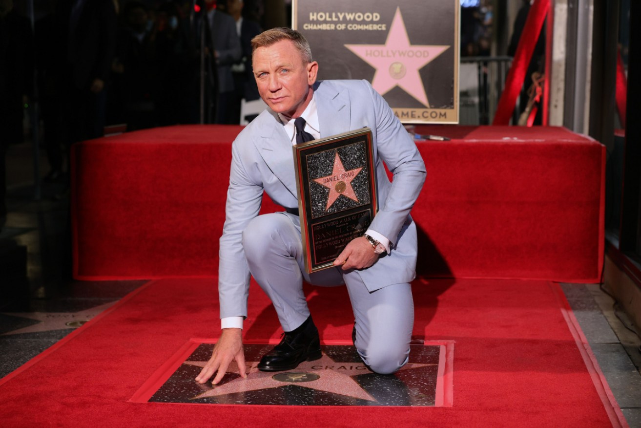 James Bond star Daniel Craig has taken a permanent place on Hollywood's Walk of Fame.
