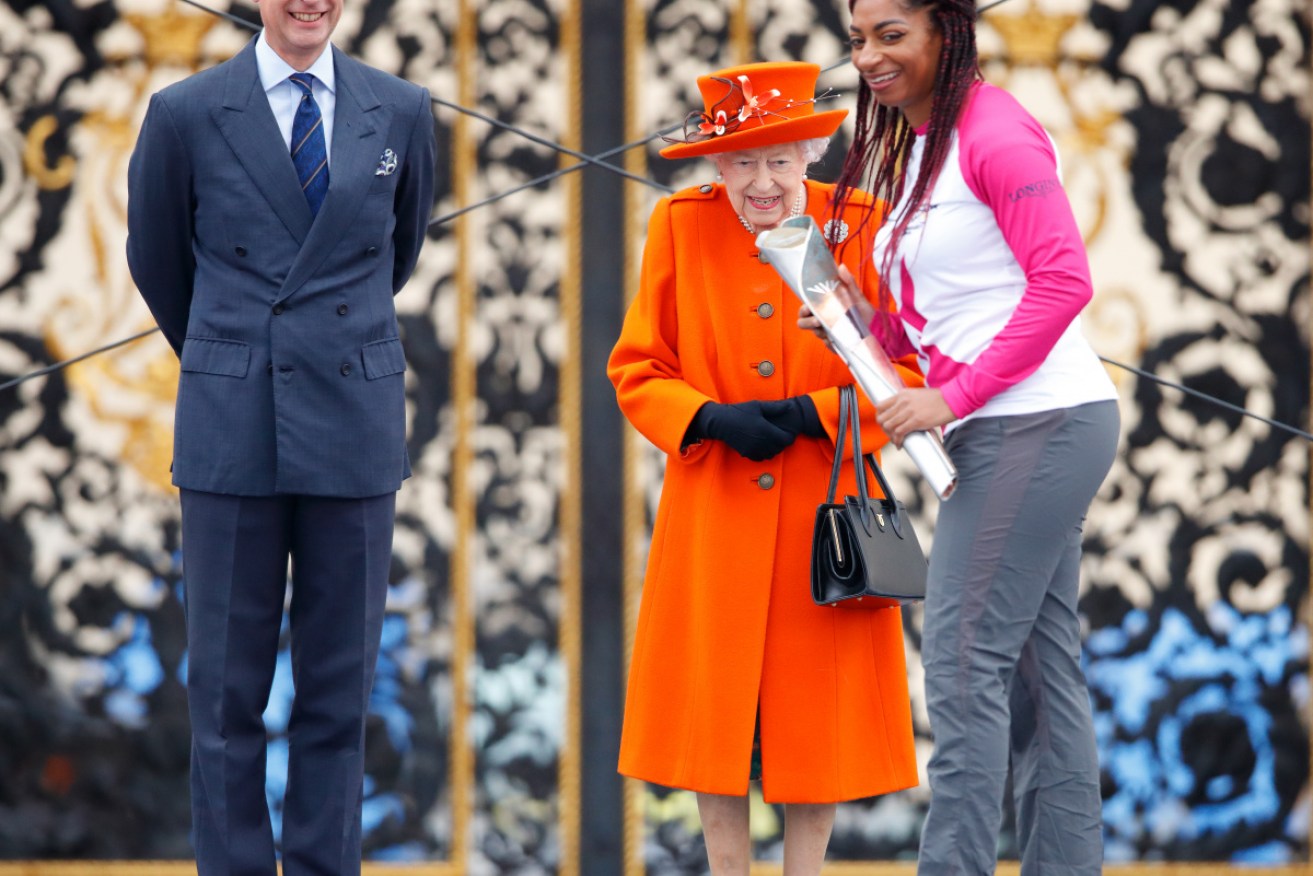 The Queen, Prince Edward and athlete Kadeena Cox at the baton launch at Buckingham Palace.