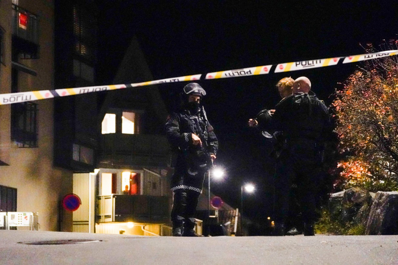 Norwegian police seal off the crime scene following fatal attacks in the town of Kongsberg.