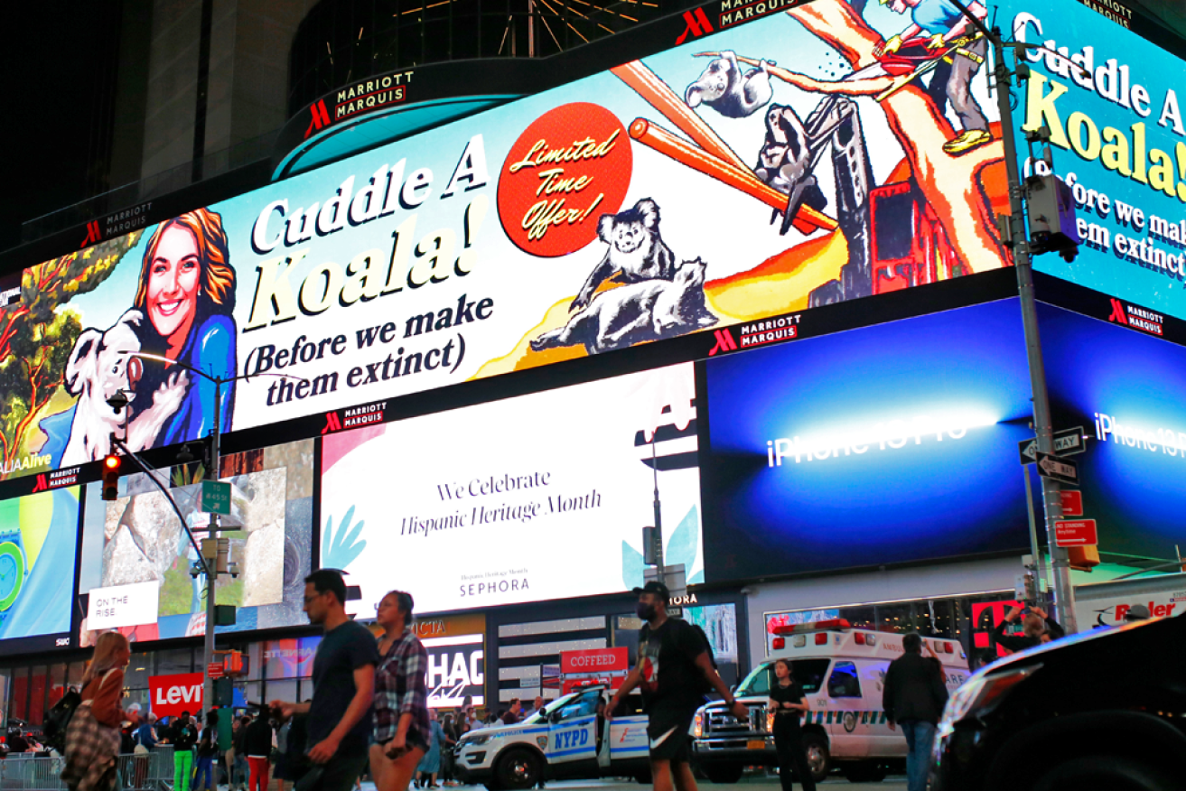Australian comedian Dan Ilic lit up Times Square in New York City with a series of climate change billboards.