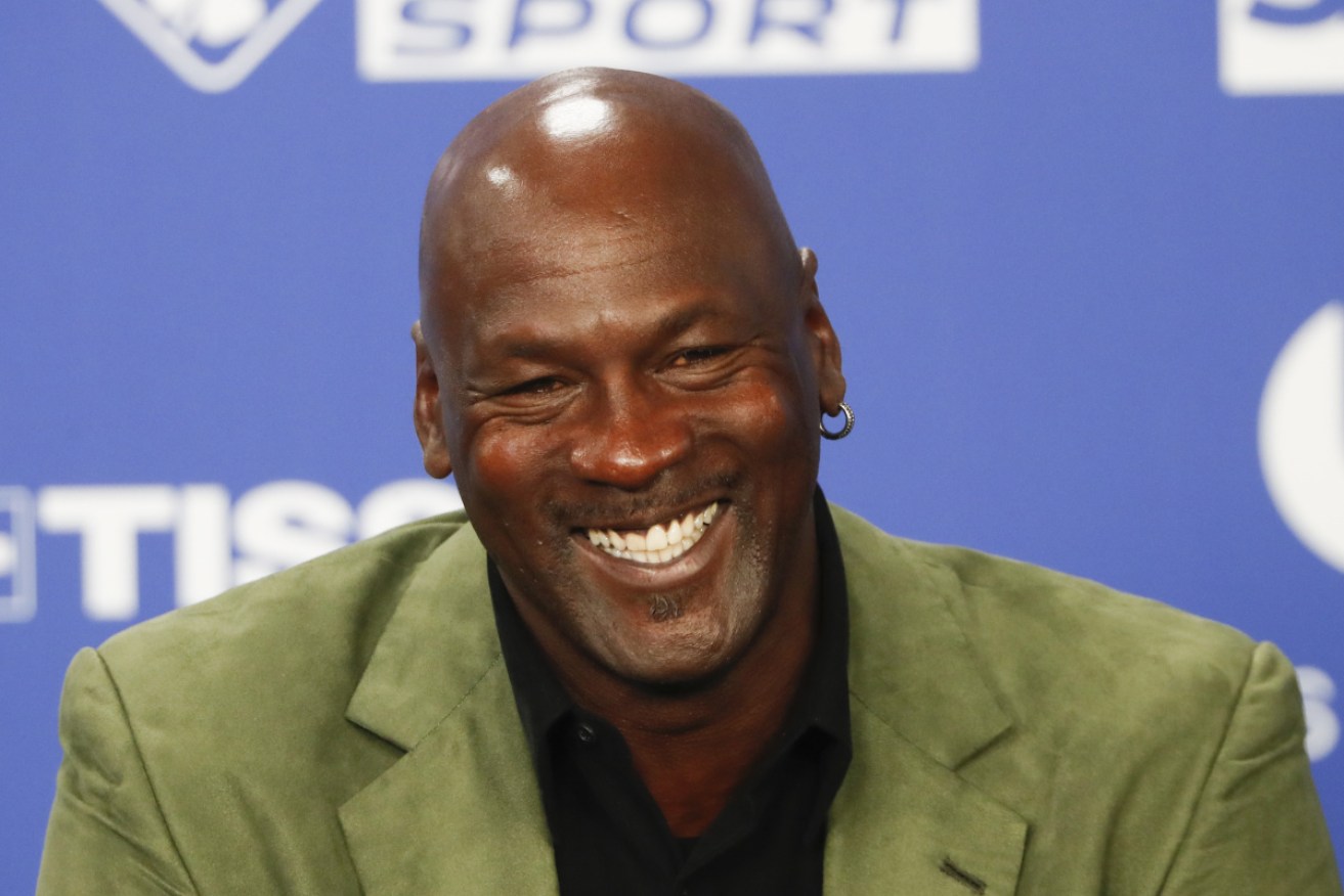 A pair of basketball shoes worn by Michael Jordan have fetched almost $1.96 million at auction.