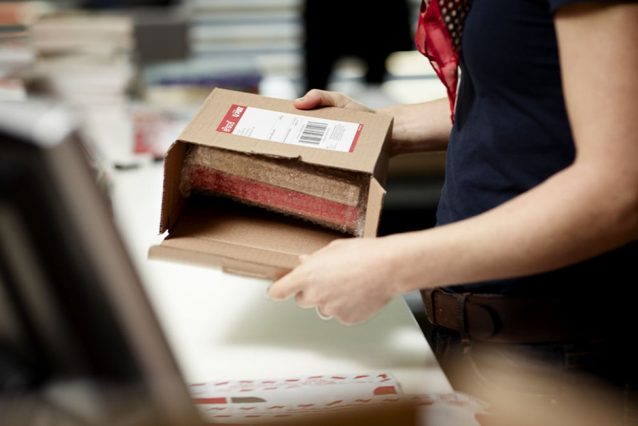 Australia Post is investing $400 million in its delivery network over eight months. 