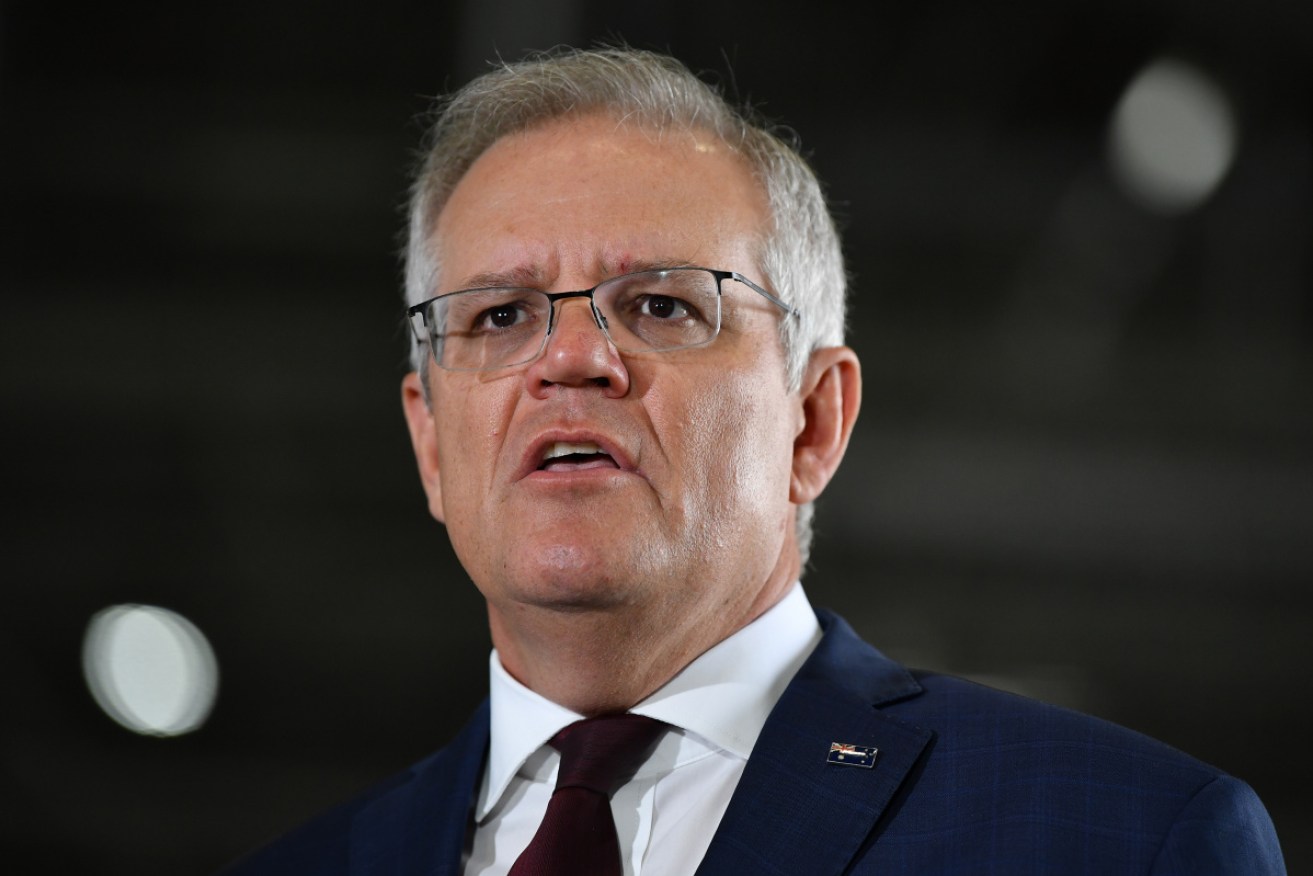 Scott Morrison is under fire over a push to save three of his government's sitting MPs.
