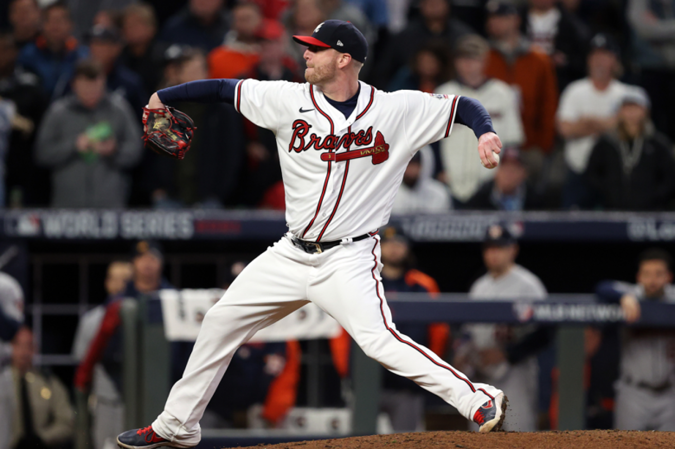 Braves pitcher Will Smith sends down a two-finger curve ball to lock in Atlanta's latest win.