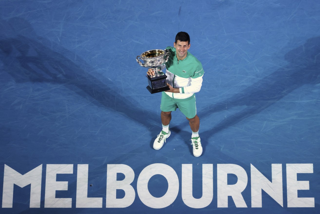 Then and now: Novak Djokovic was celebrating his latest title in 2021. Now the champion is an outcast.