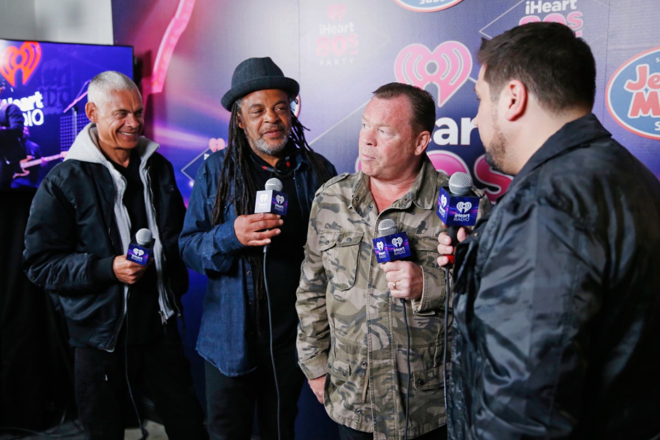 Astro (second left), with fellow band members Mickey Virtue and Ali Campbell.