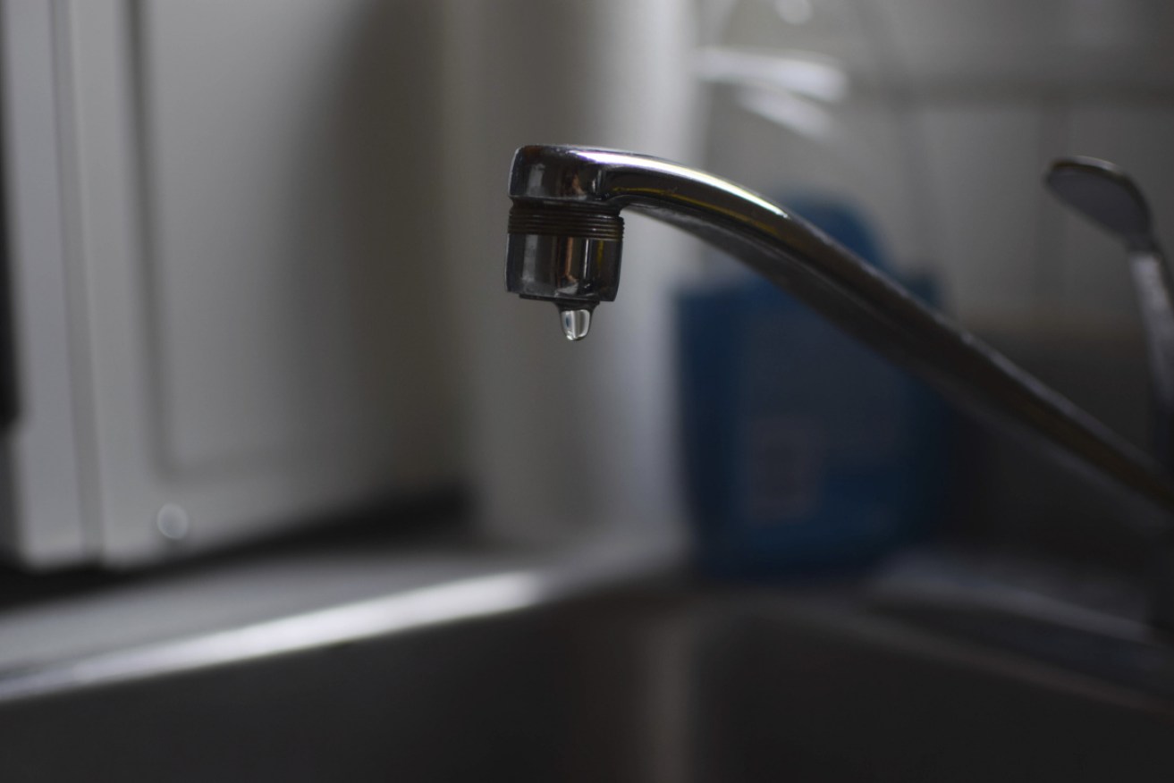 Lead from old pipes in the Flint river broke off and flowed through taps in the city.