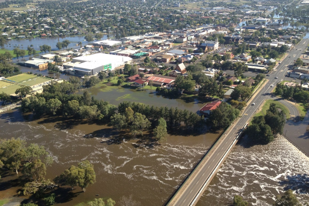 Forbes residents are ready to evacuate if the Lachlan river floods, as it did in 2012 (pictured).