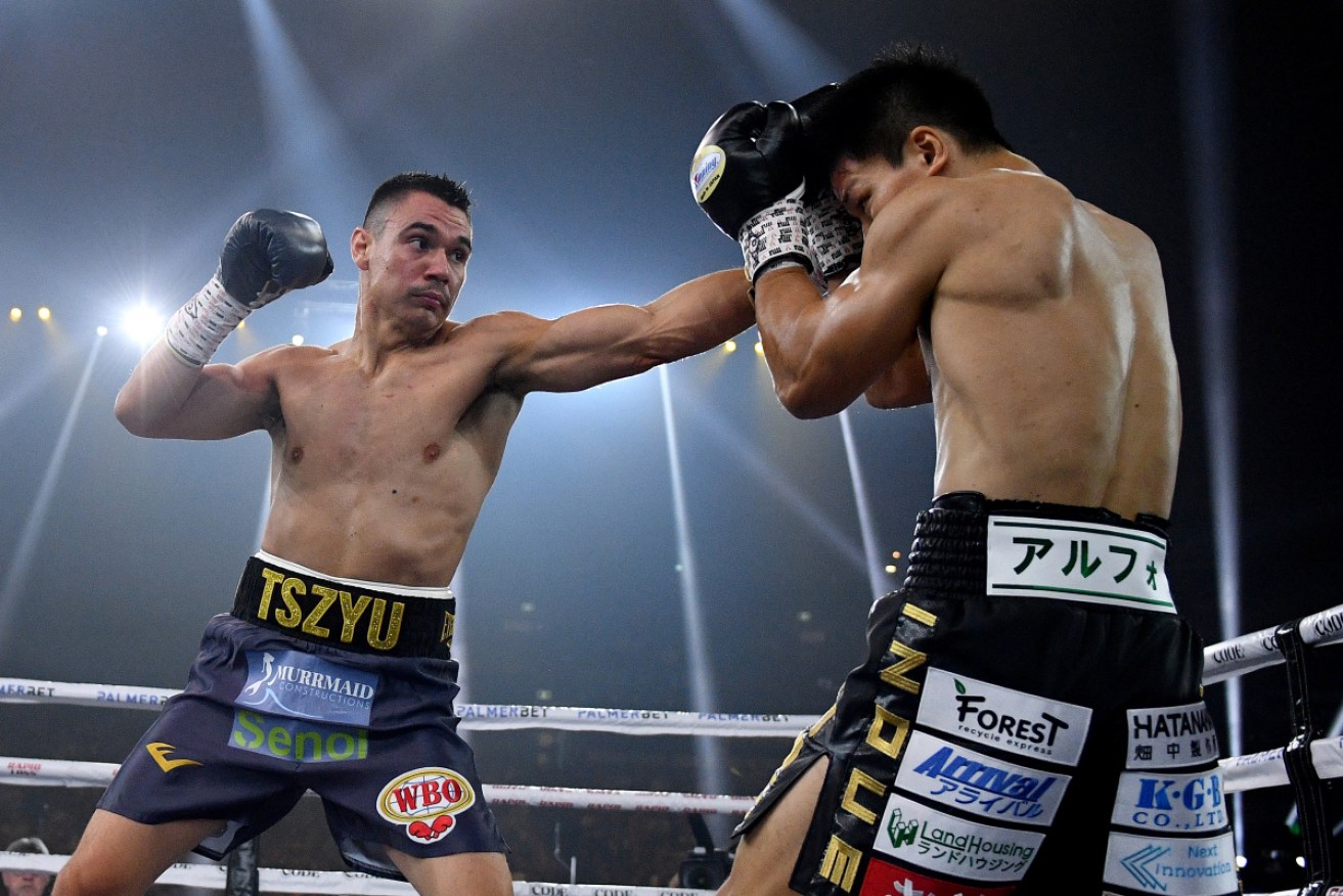 Tim Tszyu lands a blow on Takeshi Inoue in Sydney. Photo: Dan Himbrechts
