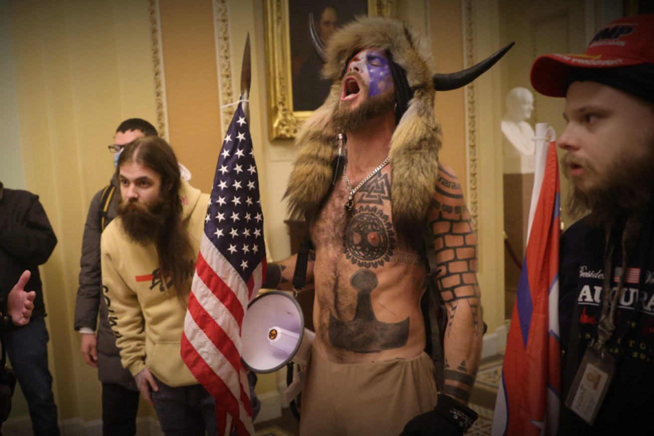 Jacob Chansley, pictured wearing horns during the Capitol Riots, must spend 41 months in jail. 