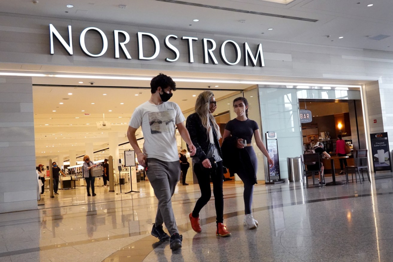 Police say about 80 people, some armed with crowbars, held up the Californian Nordstrom.