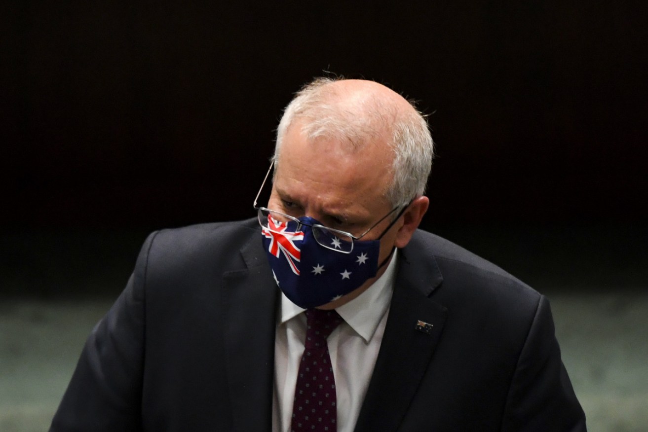 Prime Minister Scott Morrison leaves question time in Canberra on Tuesday.