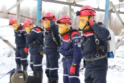 Eleven dead, dozens trapped in Siberian mine