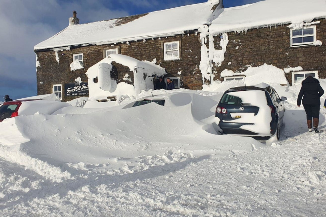 Snow is still piled high against the pub – with roads in the area remaining impassable. Photo: AAP