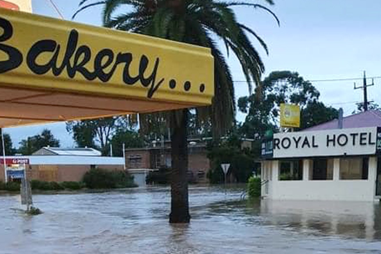 Several towns across Queensland's south, including Inglewood, remain on flood watch after 24 hours of downpours.