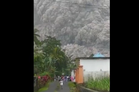 Thousands flee as erupting Indonesia volcano blankets villages in huge ash cloud