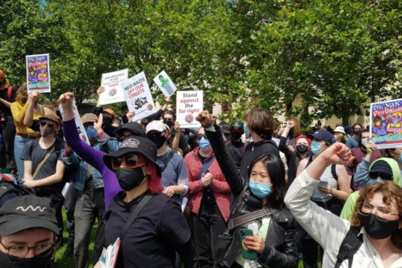 Vaccine refuseniks rallied in one part of Melbourne's CBD, while anti-fascists turned out across town to support mandatory inoculations.