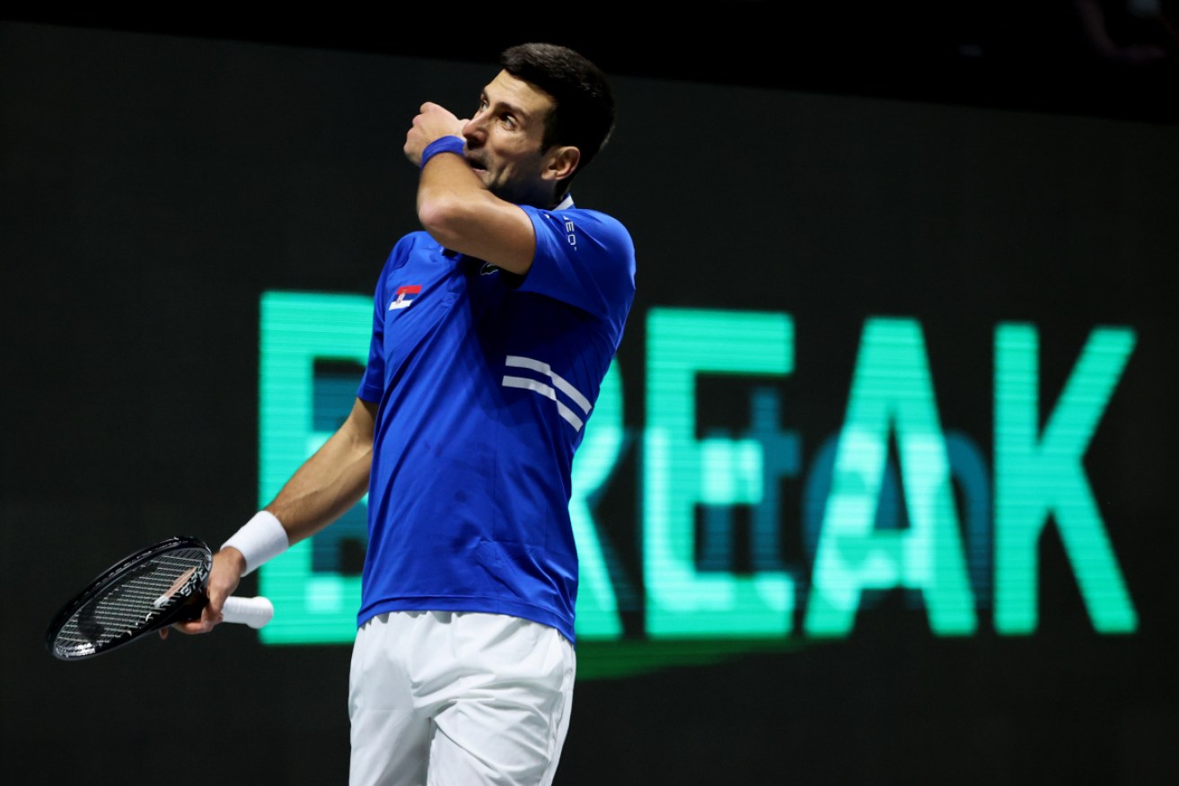 It's still uncertain whether Novak Djokovic will defend his singles title at the Australian Open.