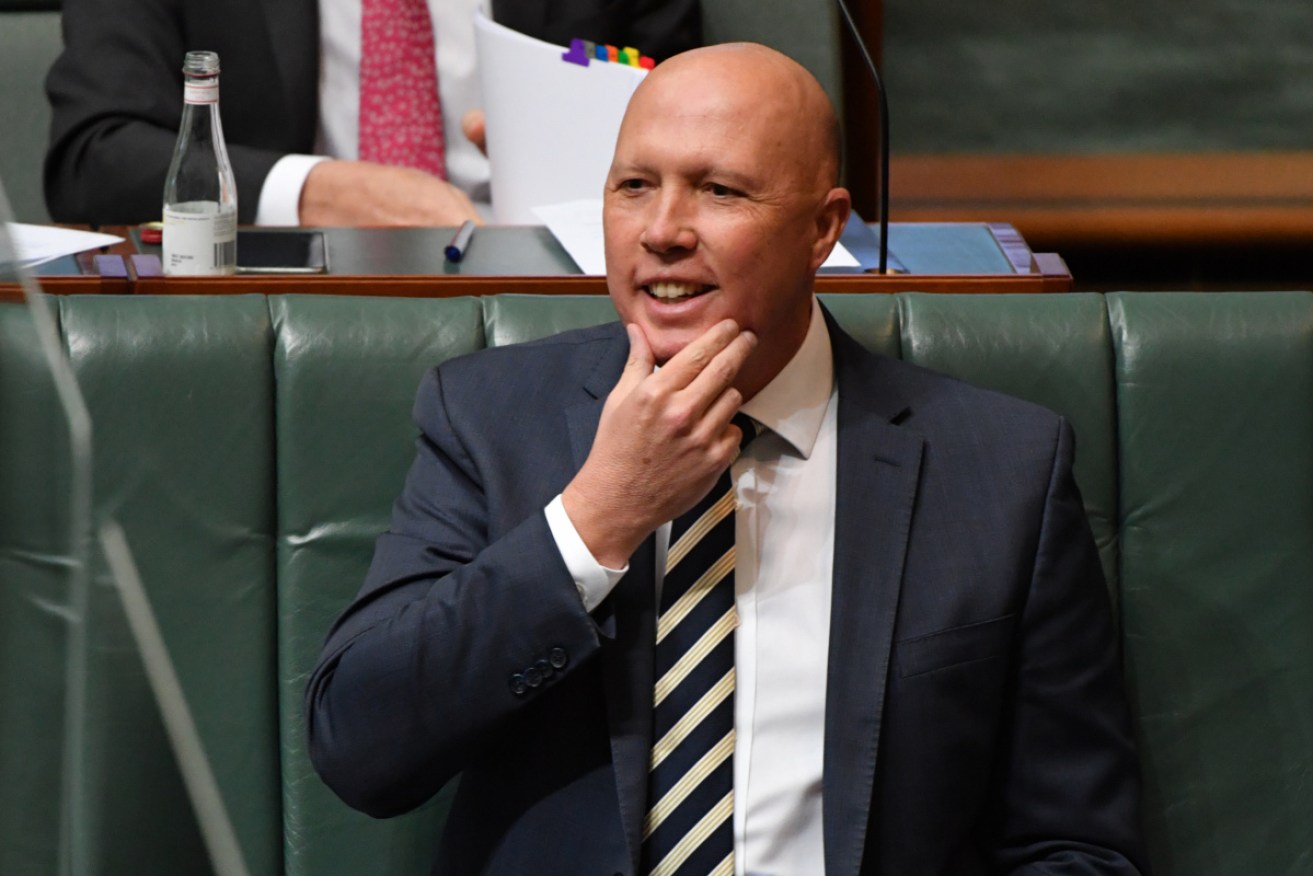 Peter Dutton has been ordered to pay half of a refugee activist's costs for a court hearing. 