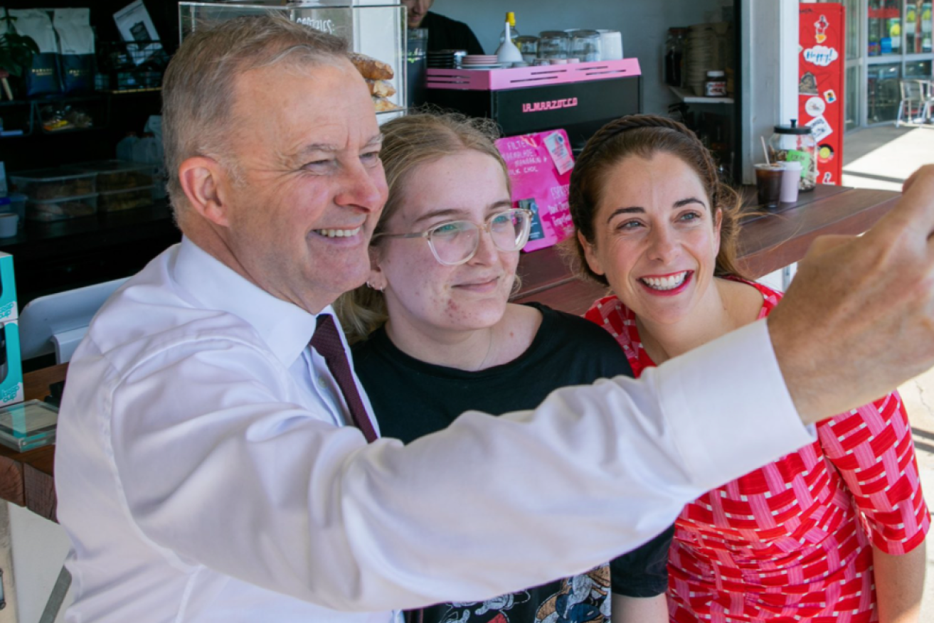Mr Albanese with Anika Wells (right) in Queensland on Monday.