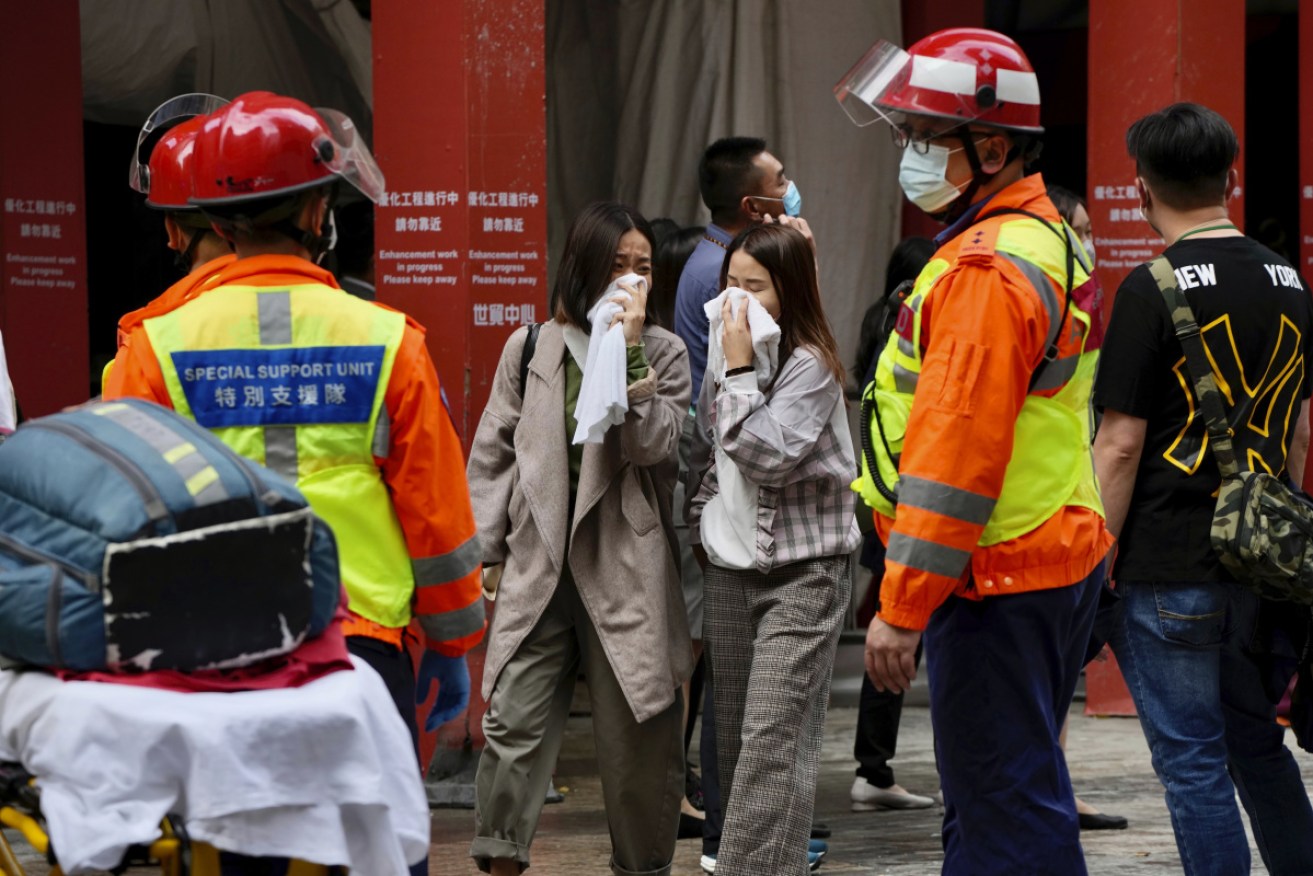 About 150 people are trapped on the roof of Hong Kong's World Trade Centre after a fire broke out on Wednesday.