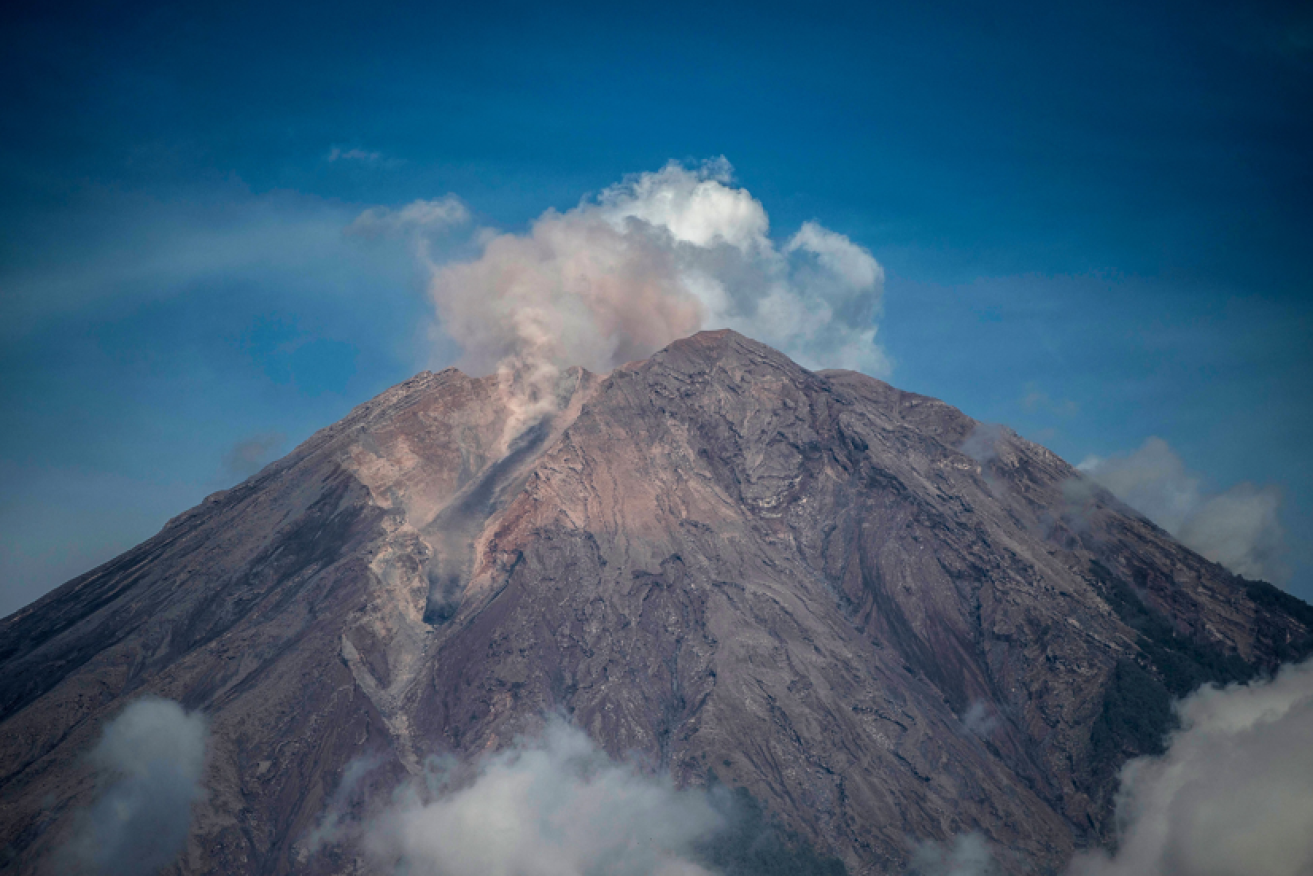 Mount Semeru treats Indonesia to a moment of relative calm before the latest massive eruption. <i>Photo: Getty</i>