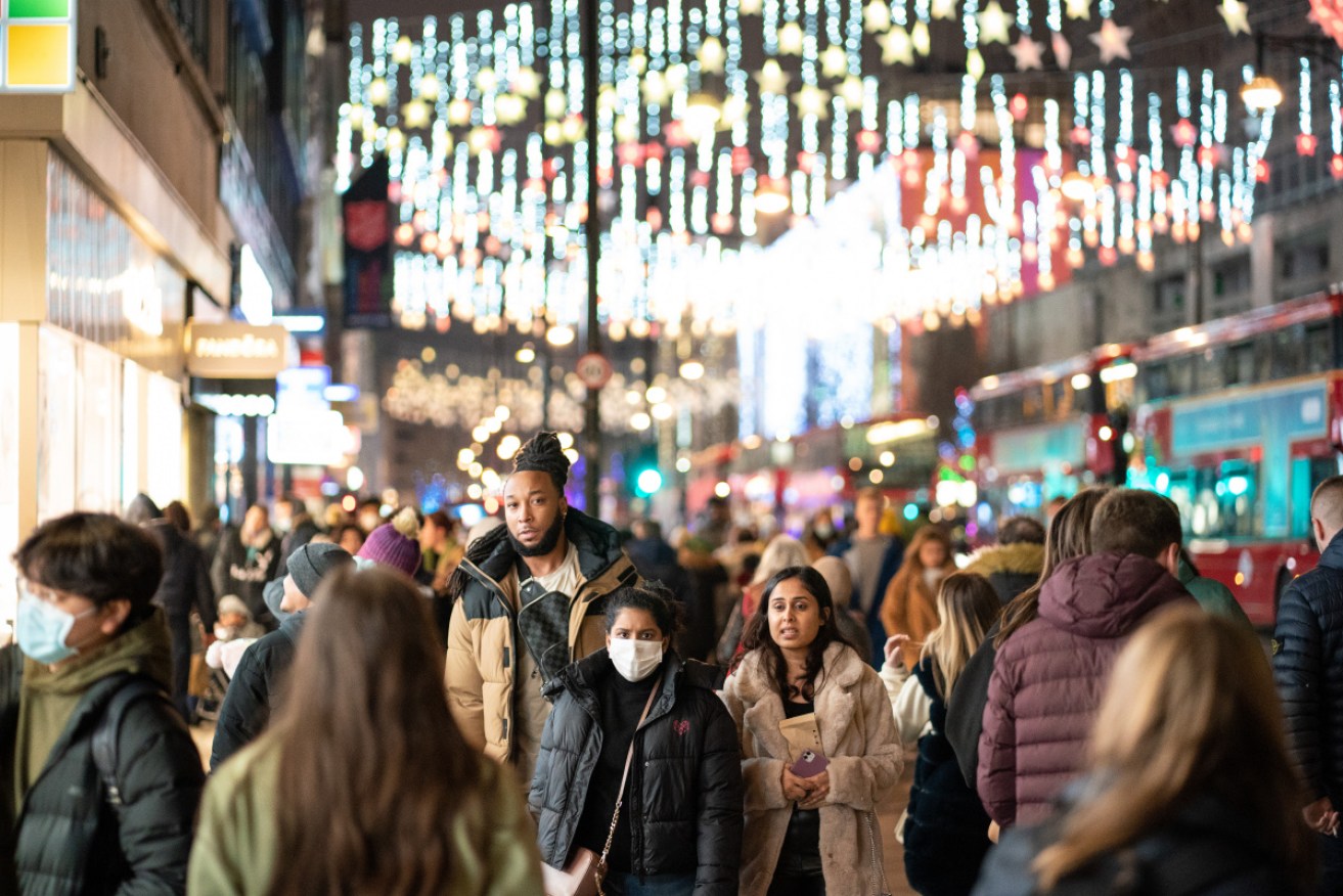 Britain might face increased virus restrictions for Christmas amid a surge of Omicron infections.