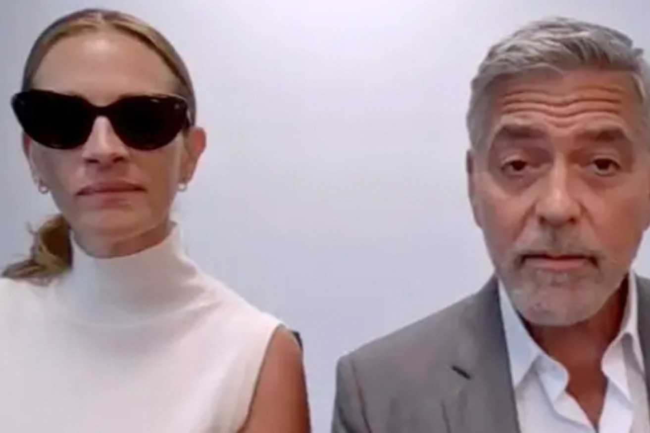 A silent Julia Roberts and a deadpan George Clooney in their TV prank.