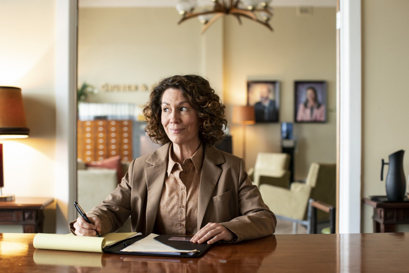 Kitty Flanagan returns to Gruber & Associates, and she promises the brown suit is back.
