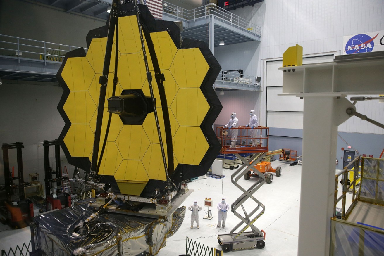 Poor weather conditions have delayed by another day the launch of the James Webb space telescope.