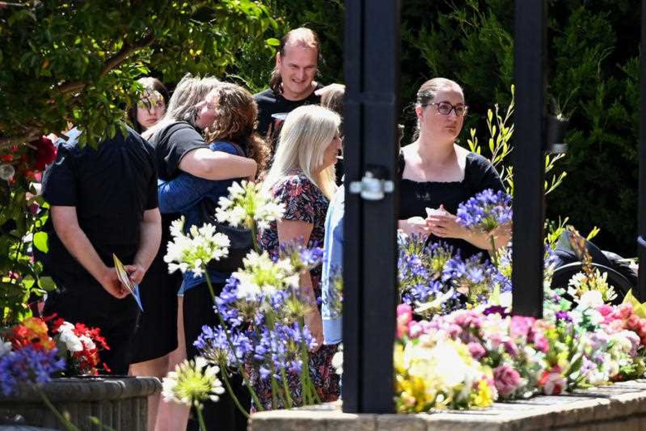 Mourners leave Jye Sheehan's funeral in Tasmania on Friday morning.