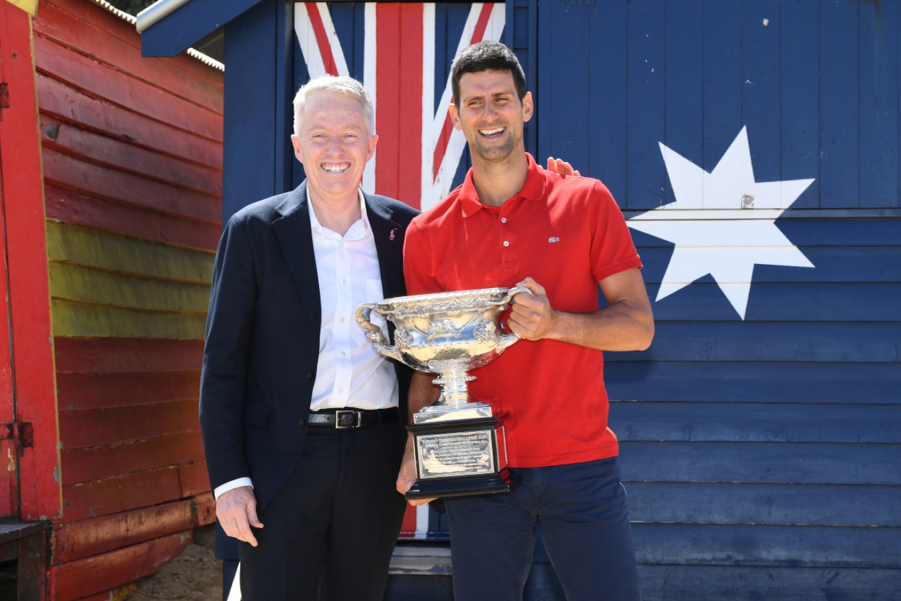 Craig Tiley and Novak Djokovic after the Serb's 2021 Australian Open triumph.