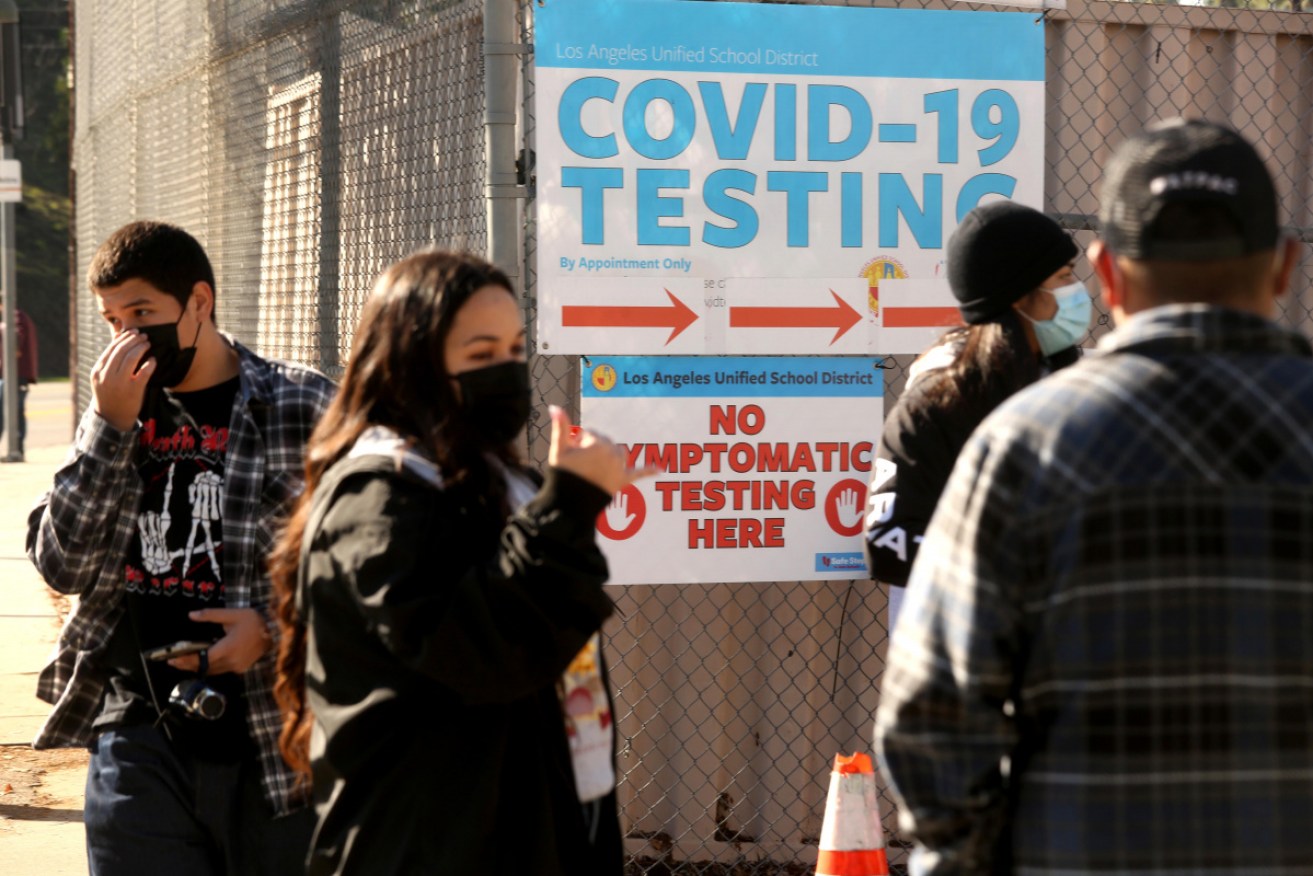 A COVID-19 testing crunch has led to inadequate supplies and long lines in many places in the US.
