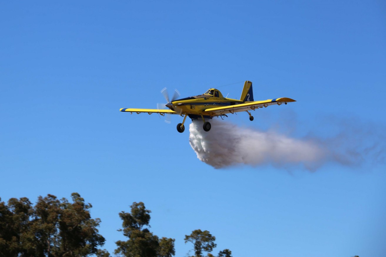 Water bombing planes have been deployed as a fire threatens homes in southern WA.