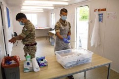 UK troops help hospitals as Omicron cases surge