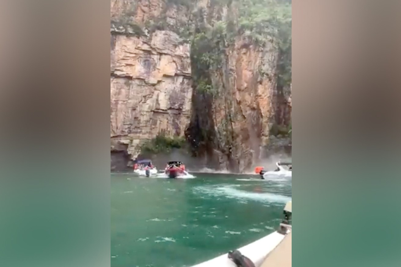 Ten people have died after a rock face collapsed on motor boats visiting a waterfall in Brazil