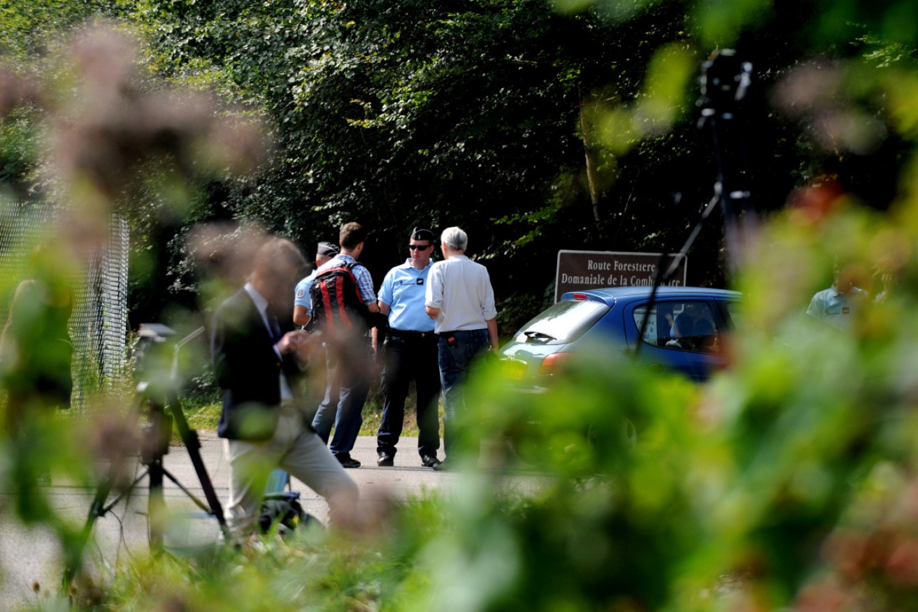 Police at the murder scene in the French Alps in 2012.