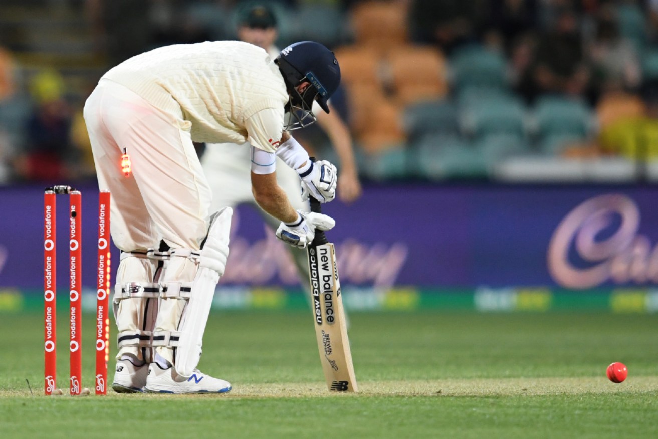 Joe Root is bowled as  England collapses late on the third day of the fifth Ashes Test in Hobart. 