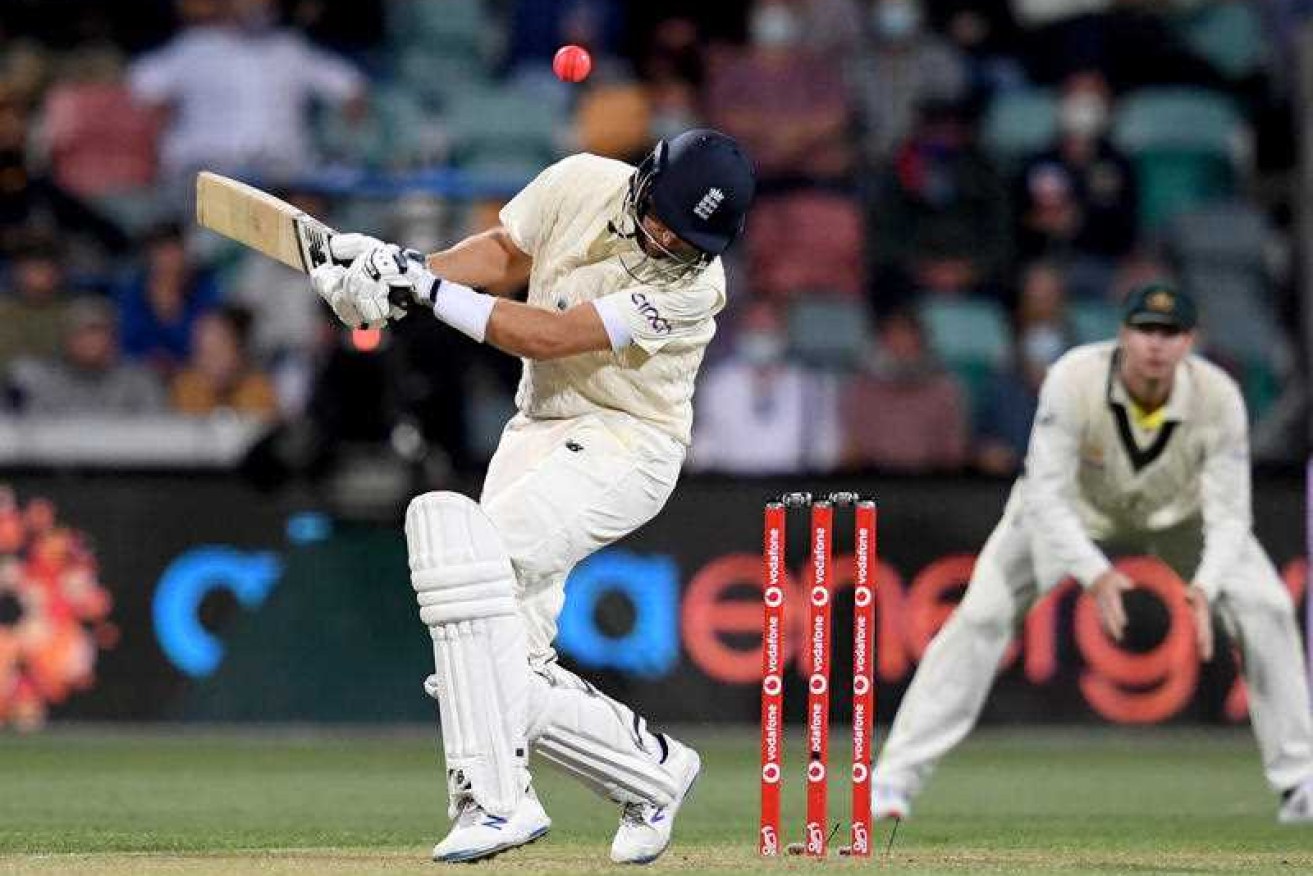 England captain Joe Root ducks under a bouncer on day three of the Hobart Test.
