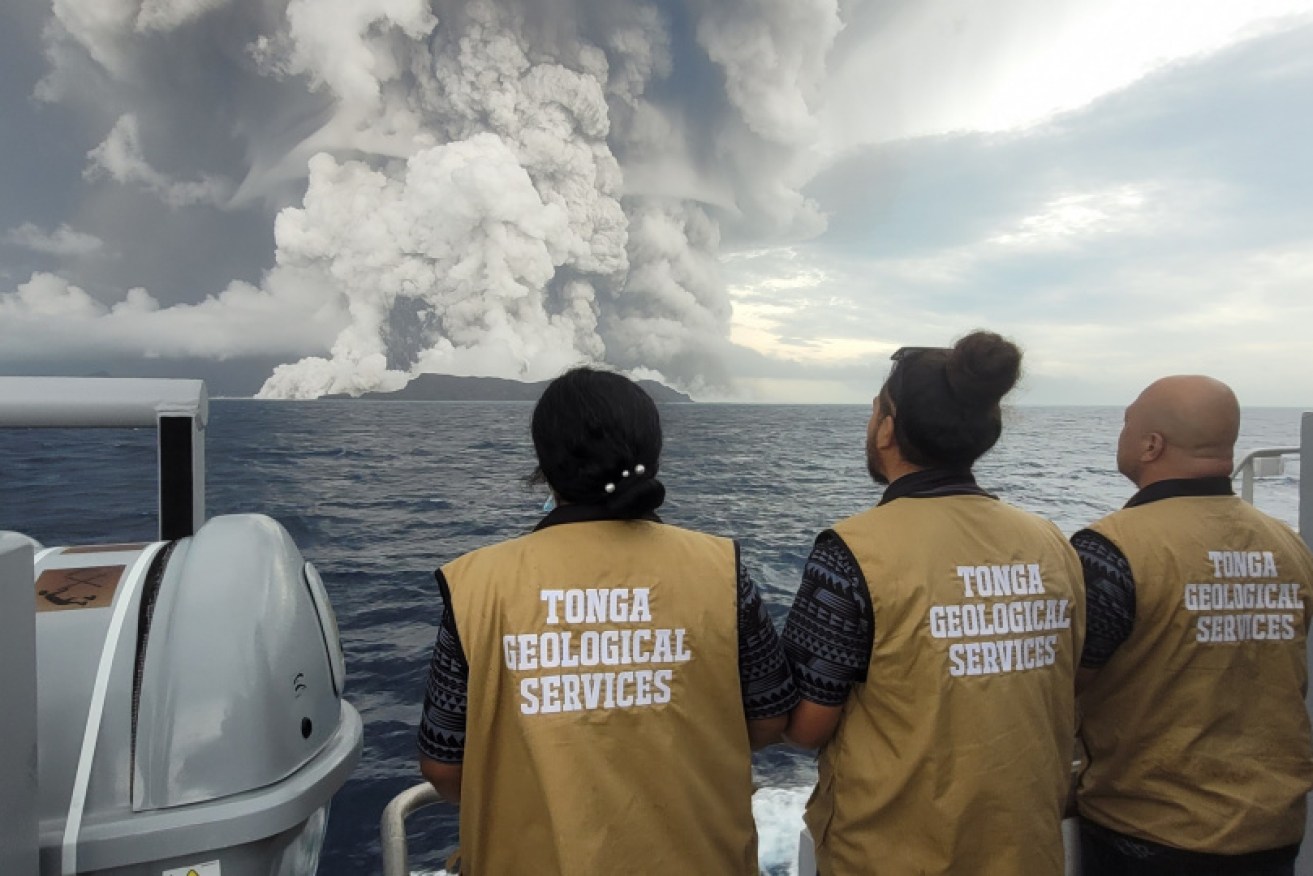 Geologists monitor the volcano, shortly after Saturday's massive eruption.