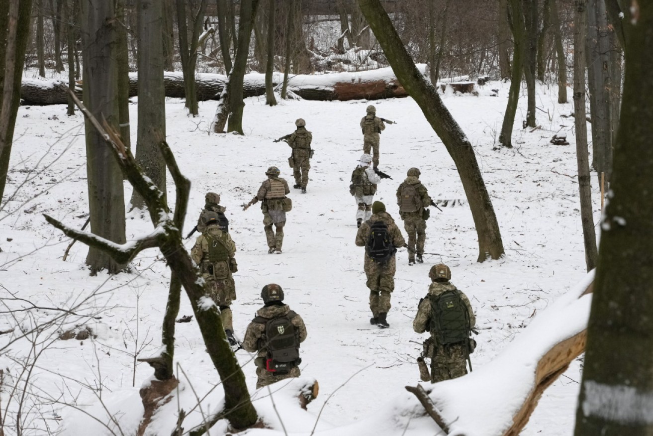 Ukraine troops patrol the tense border region as Russia sends more troops. <i>Photo: AP</i>