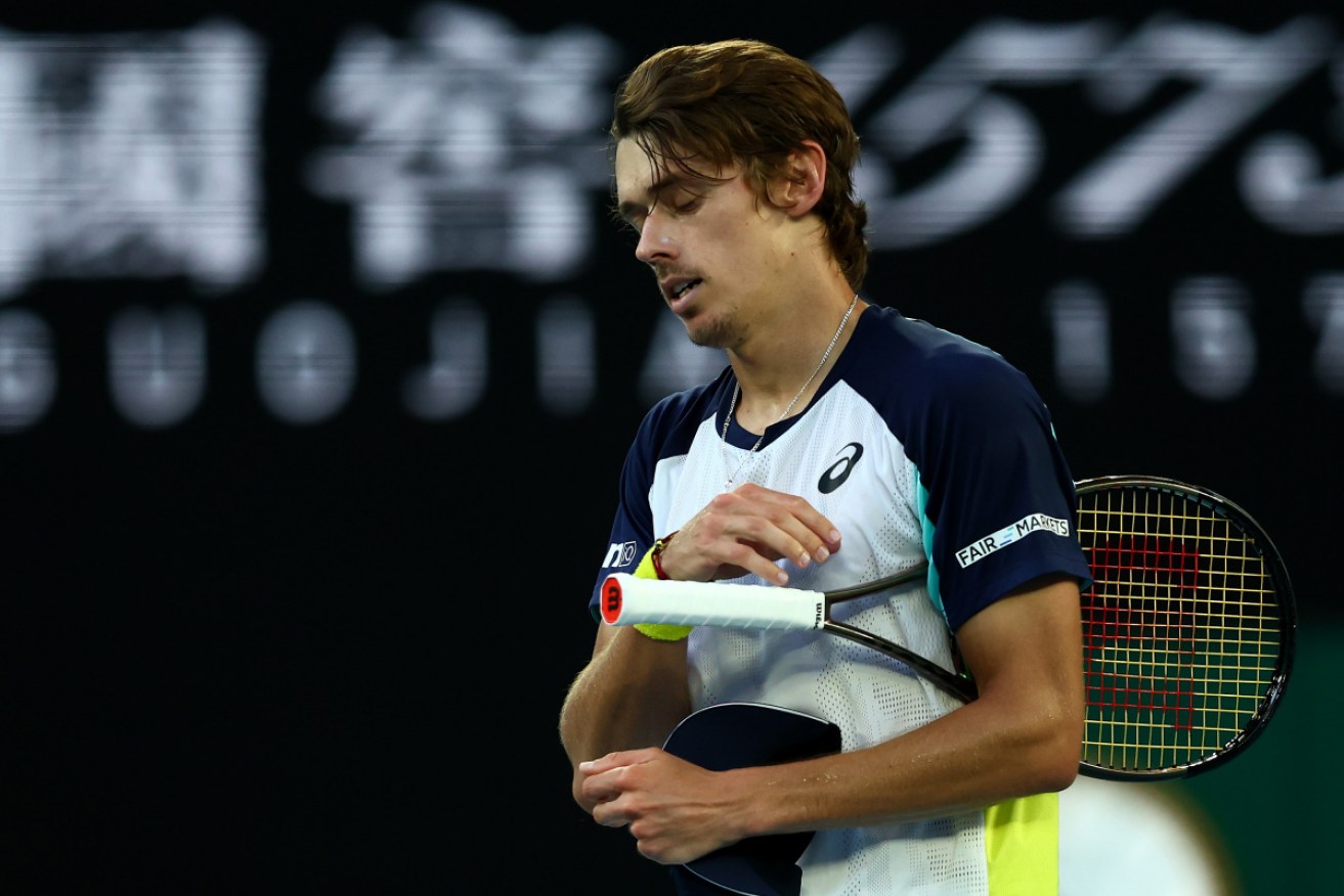 Alex de Minaur looks dejected after his exit from the Australian Open. 