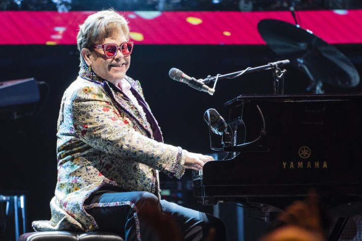 Elton John spends night in hospital after slip
