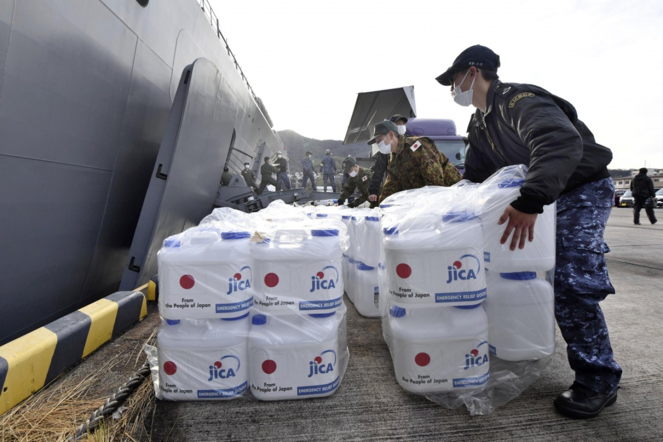 Humanitarian relief supplies are being distributed in Tonga amid concerns over COVID-19. 