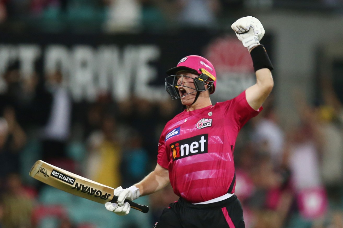 Sydney Sixers youngster Hayden Kerr celebrates victory over the Adelaide Strikers on Wednesday night. 