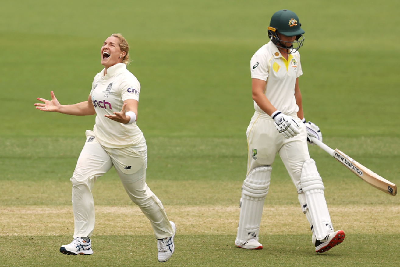 England's Katherine Brunt rejoices after taking Meg Lanning's scalp on day four of the Ashes series.<i>Photo: Getty</i>