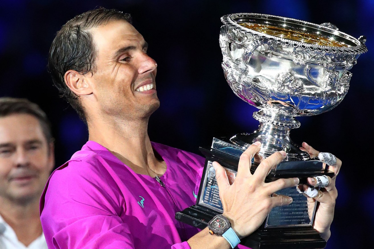 Rafael Nadal can't hide his delight after securing his second Australian Open trophy.